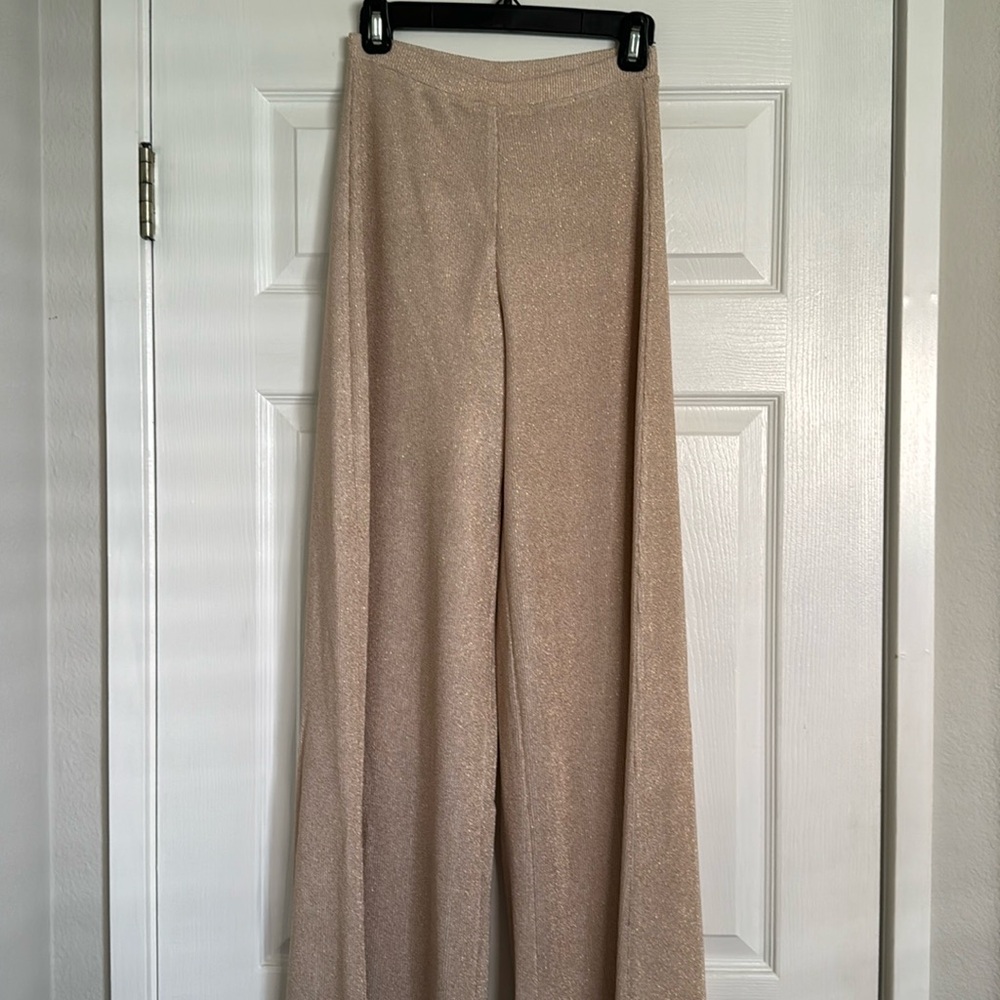 Bell bottom gold sparkled pants by Feather Bone (Anthropologie).